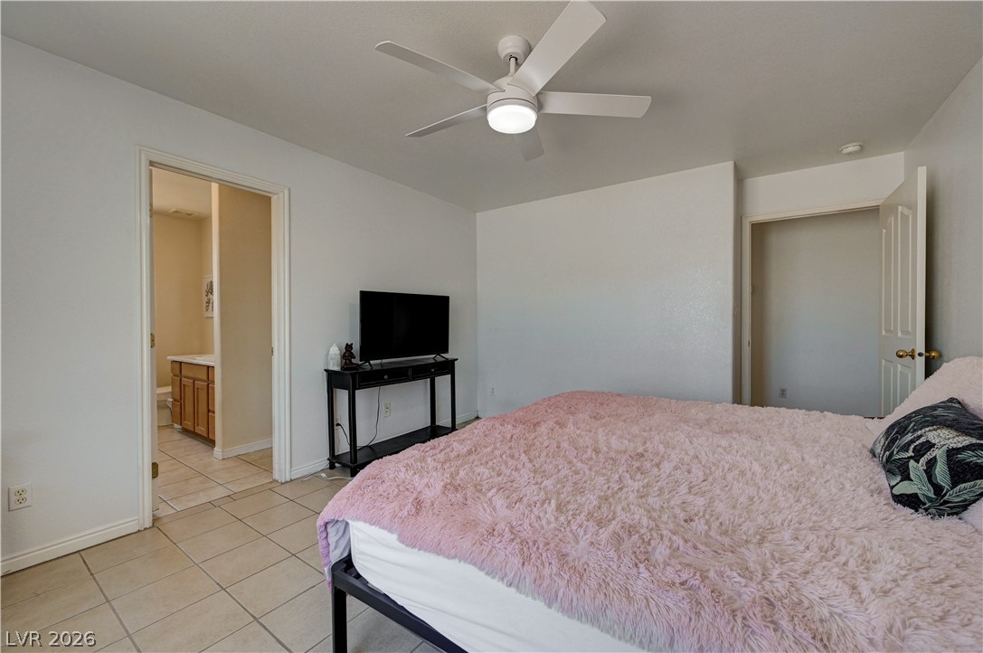 1272 Liston Avenue Logandale, NV 89021 - Photo 36 of 61 Relax in comfort with a quiet bedroom offering convenient bathroom access.