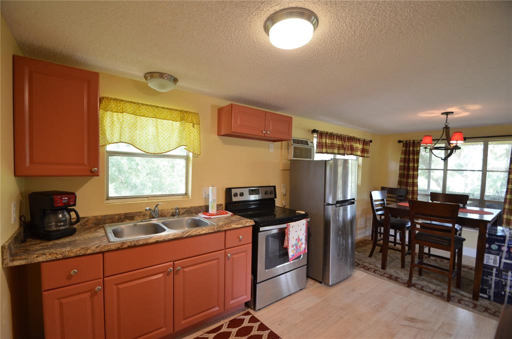0 Southeast Highway 31 Arcadia, FL 34266 - Photo 11 of 45 a kitchen with granite countertop a sink stainless steel appliances and cabinets