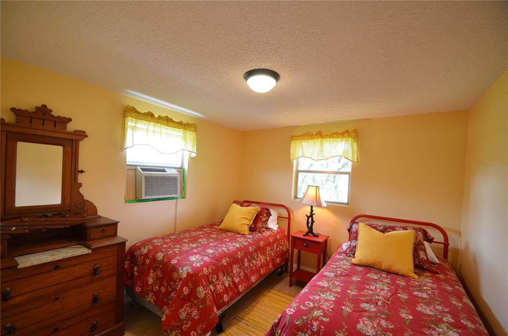 0 Southeast Highway 31 Arcadia, FL 34266 - Photo 14 of 45 a bedroom with two beds and painting on the wall