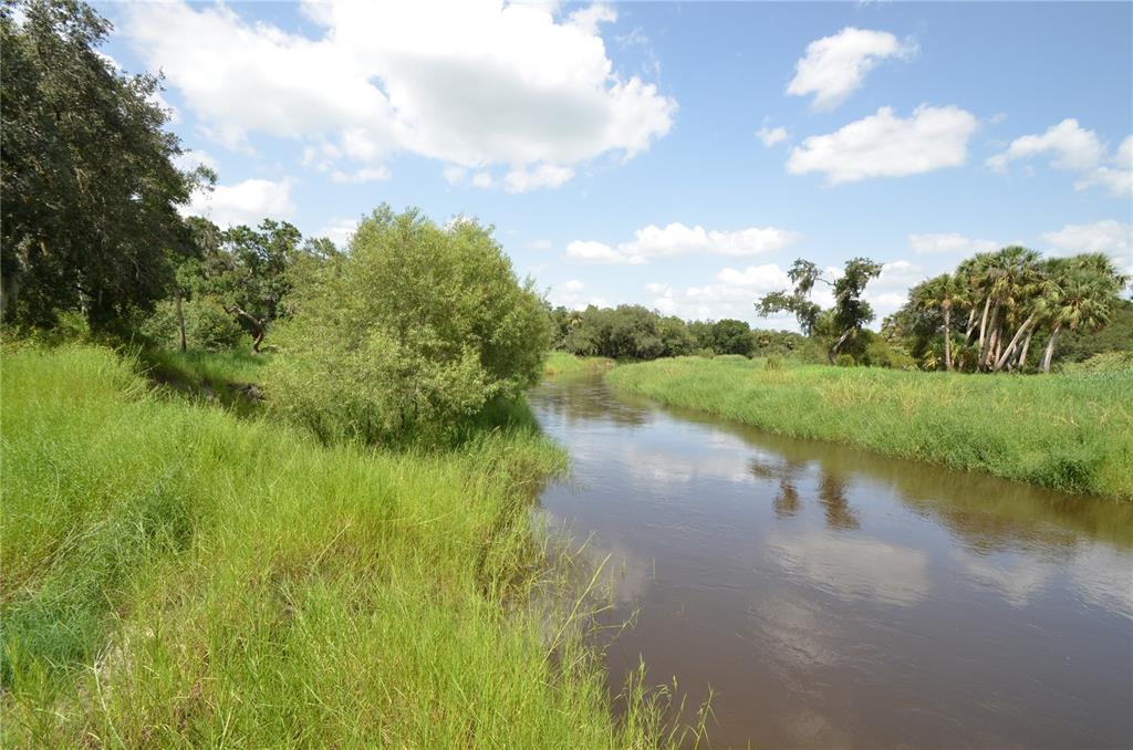 0 Southeast Highway 31 Arcadia, FL 34266 - Photo 36 of 45 a view of a lake with a big yard