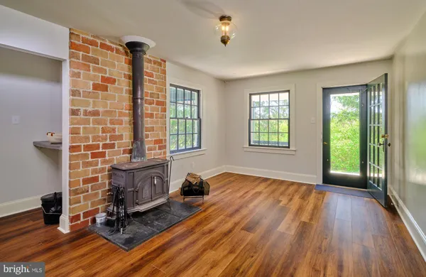 a view of entryway with wooden floor