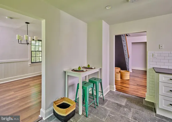 a kitchen with a stove and a microwave