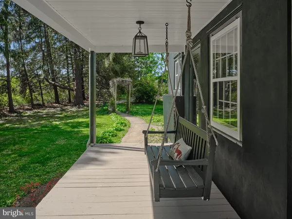 a garden view with a seating space