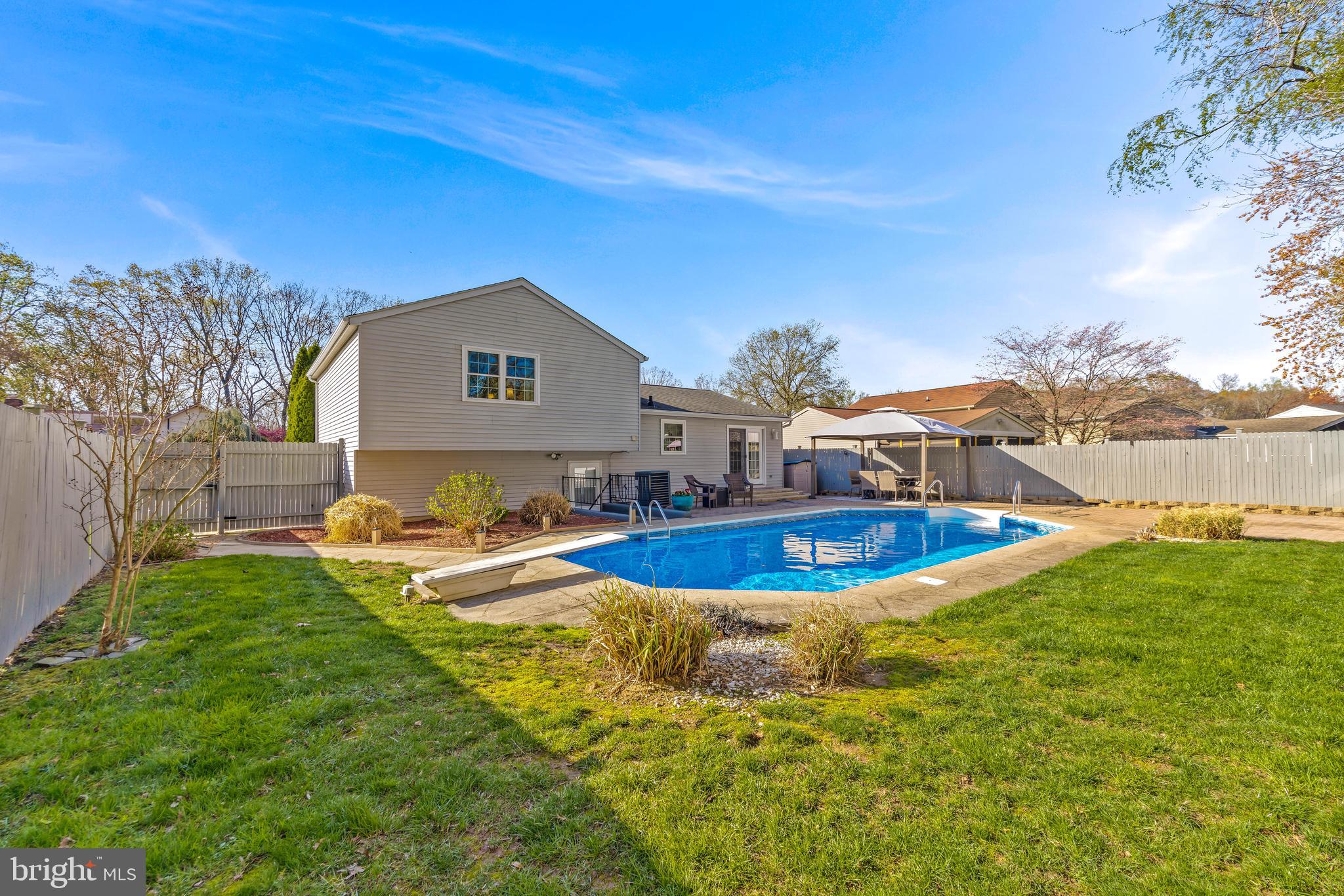 15 Yew Road Baltimore, MD 21221 - Photo 1 of 61 a view of a house with pool and a yard