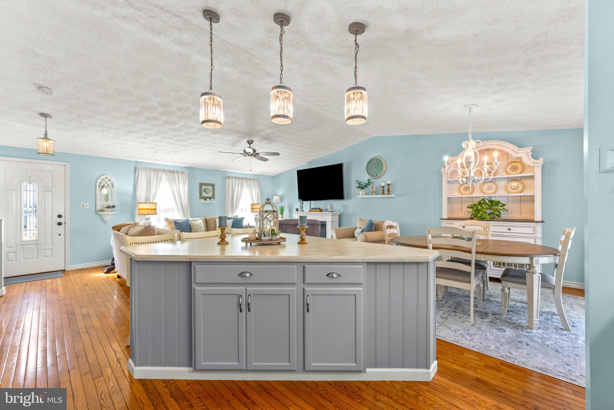 15 Yew Road Baltimore, MD 21221 - Photo 17 of 61 a view of living room with granite countertop furniture a fireplace and a flat screen tv