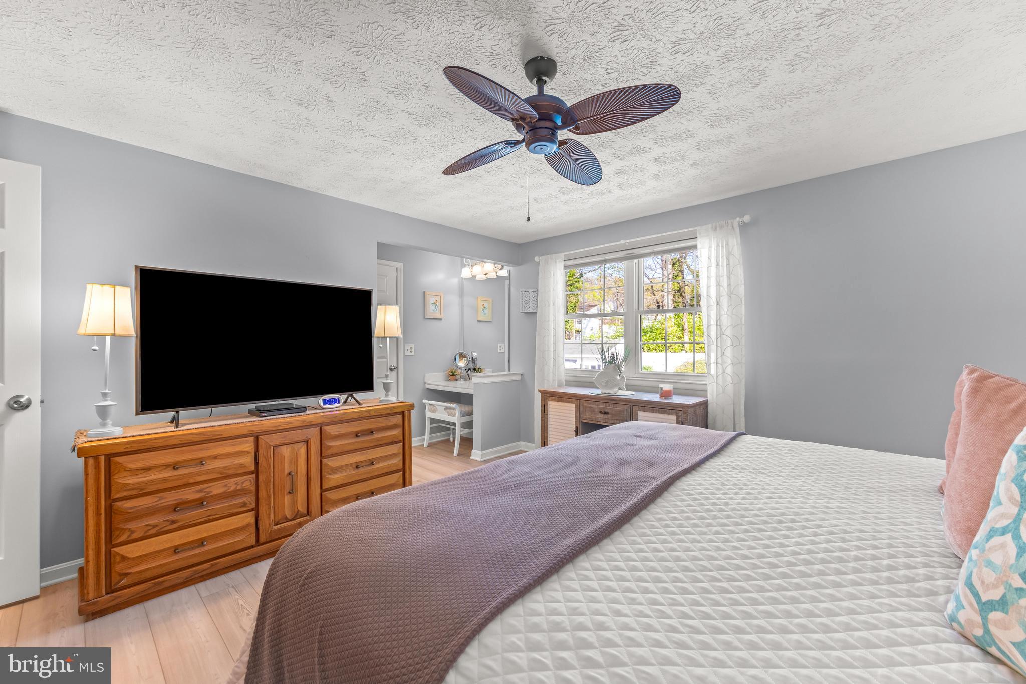 15 Yew Road Baltimore, MD 21221 - Photo 41 of 61 a bedroom with a bed and a flat screen tv