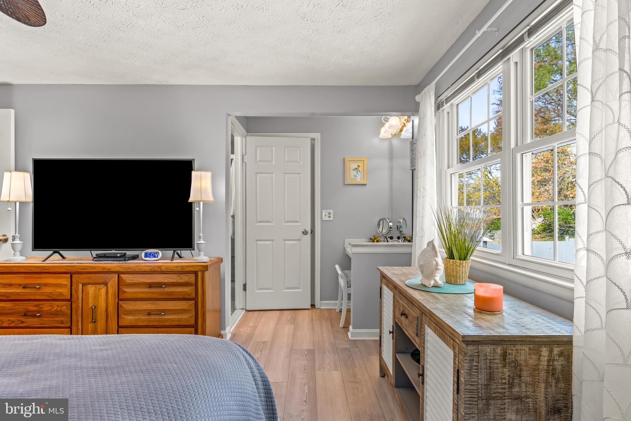 15 Yew Road Baltimore, MD 21221 - Photo 42 of 61 a bedroom with a bed and a flat screen tv