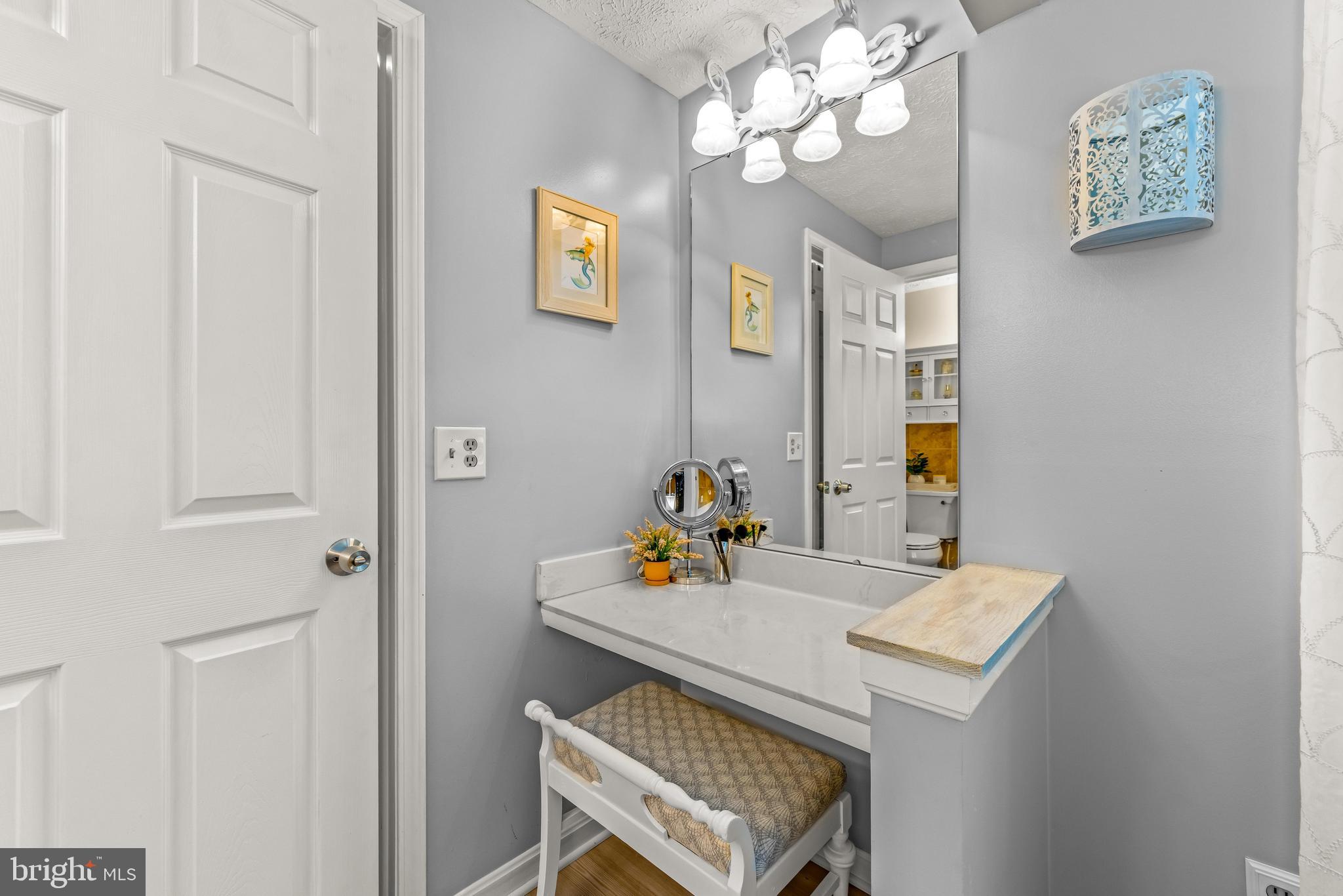 15 Yew Road Baltimore, MD 21221 - Photo 43 of 61 a view of a dining room with furniture and chandelier