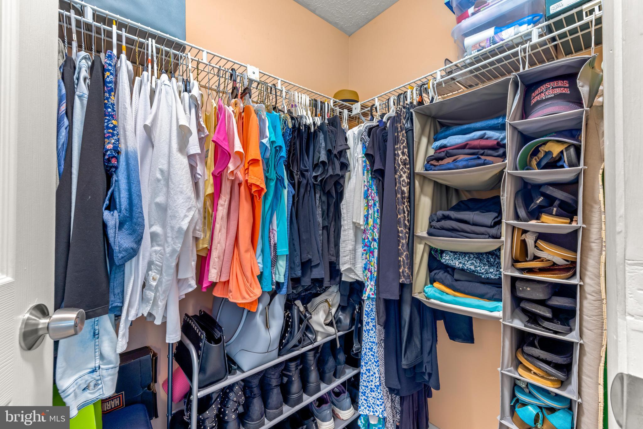 15 Yew Road Baltimore, MD 21221 - Photo 44 of 61 a view of walk in closet with clothes and shoes