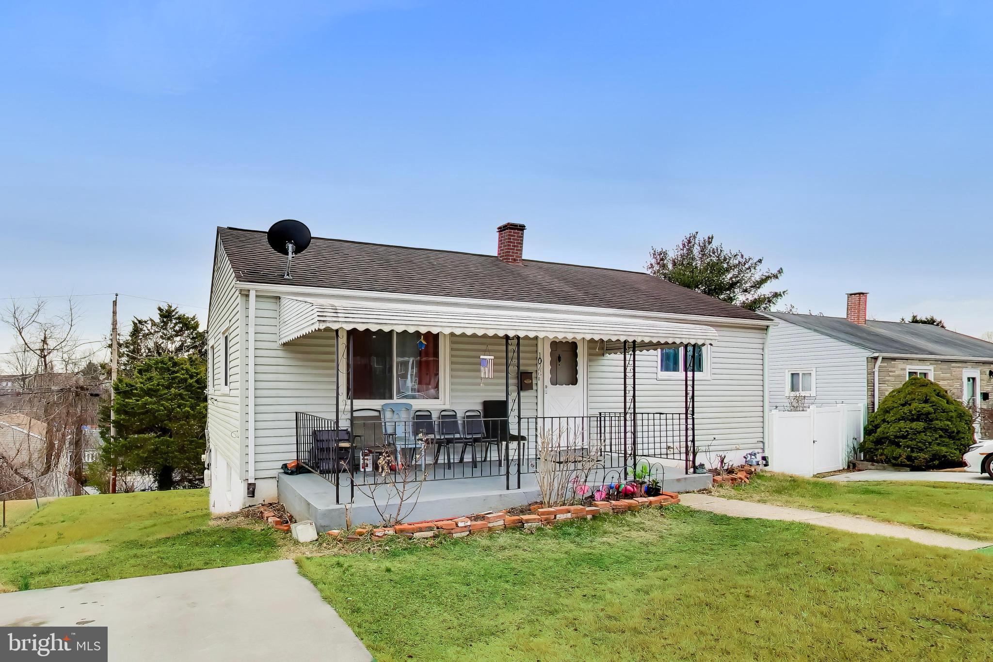 1028 Ward Street Laurel, MD 20707 - Photo 1 of 39 a front view of a house with a yard