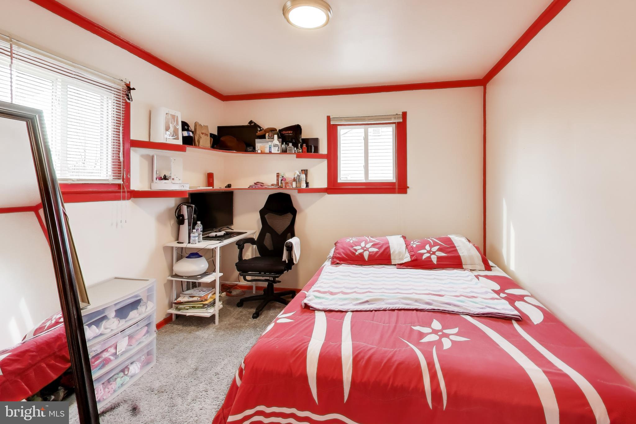 1028 Ward Street Laurel, MD 20707 - Photo 16 of 39 a bedroom with bed and a window