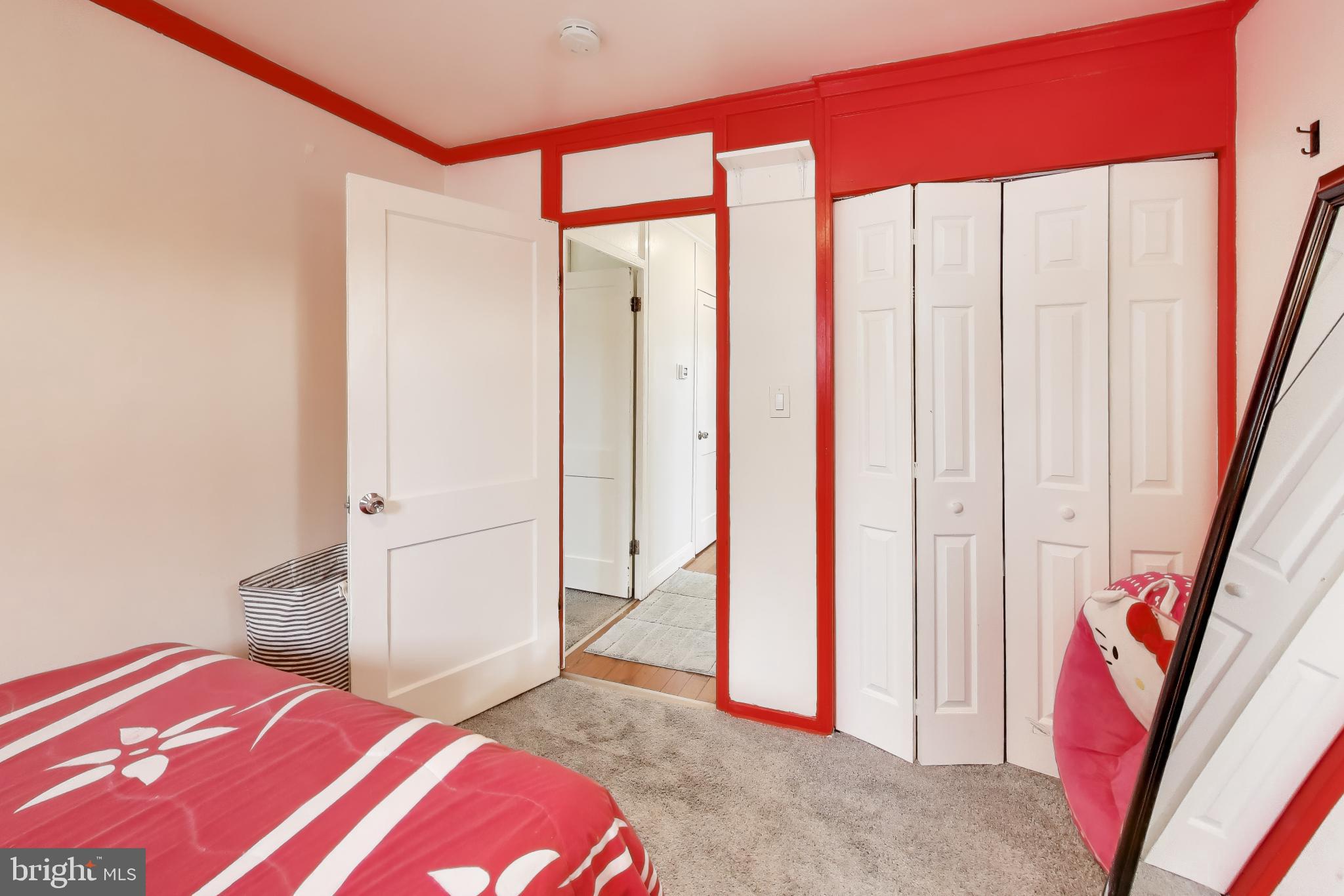 1028 Ward Street Laurel, MD 20707 - Photo 17 of 39 a bedroom with a bed and a large window