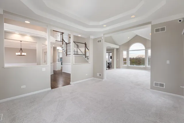 a view of a room with window and wooden floor