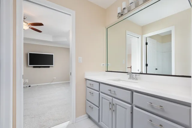 an aerial view of a residential houses with outdoor space