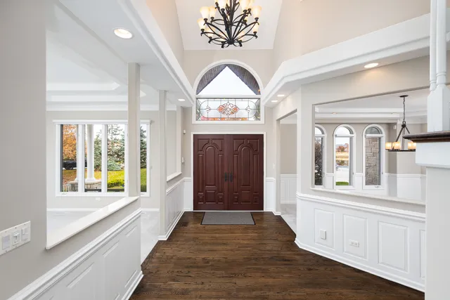 a view of a livingroom with an empty space and a fireplace