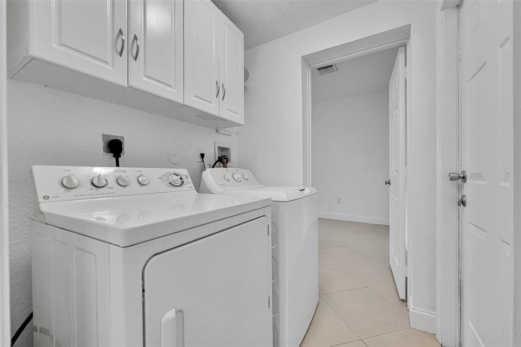 2634 Southwest 188th Avenue, Unit 2634 Miramar, FL 33029 - Photo 11 of 48 a utility room with dryer and washer