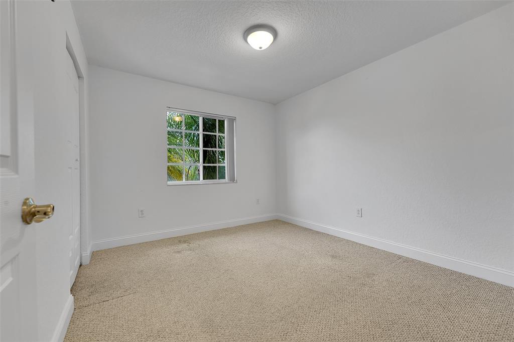 2634 Southwest 188th Avenue, Unit 2634 Miramar, FL 33029 - Photo 19 of 48 an empty room with windows