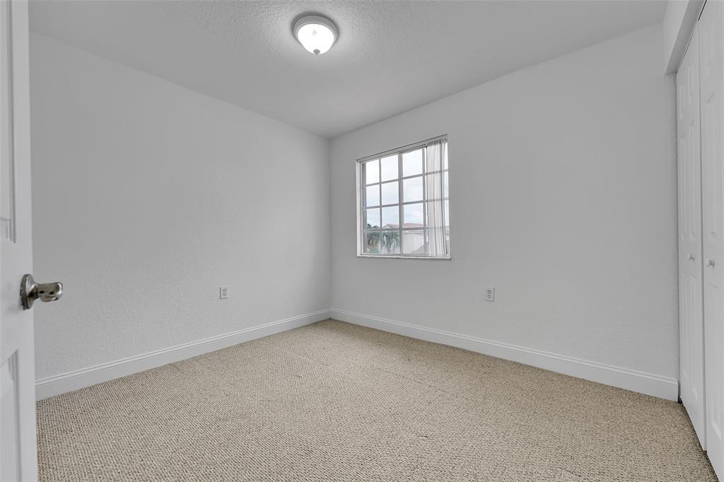 2634 Southwest 188th Avenue, Unit 2634 Miramar, FL 33029 - Photo 21 of 48 an empty room with windows