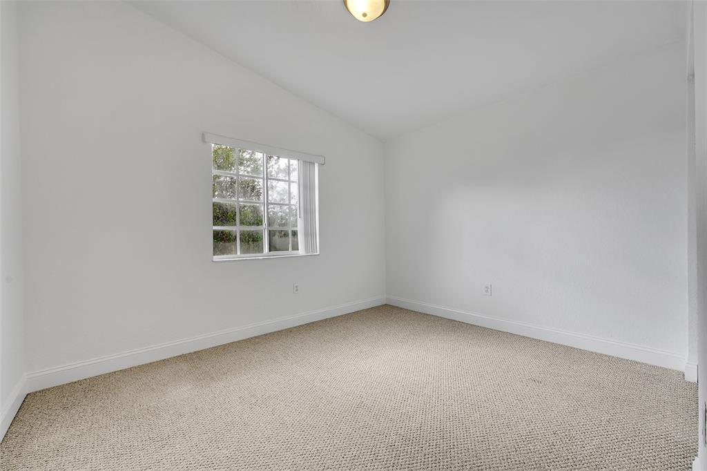 2634 Southwest 188th Avenue, Unit 2634 Miramar, FL 33029 - Photo 26 of 48 an empty room with a window