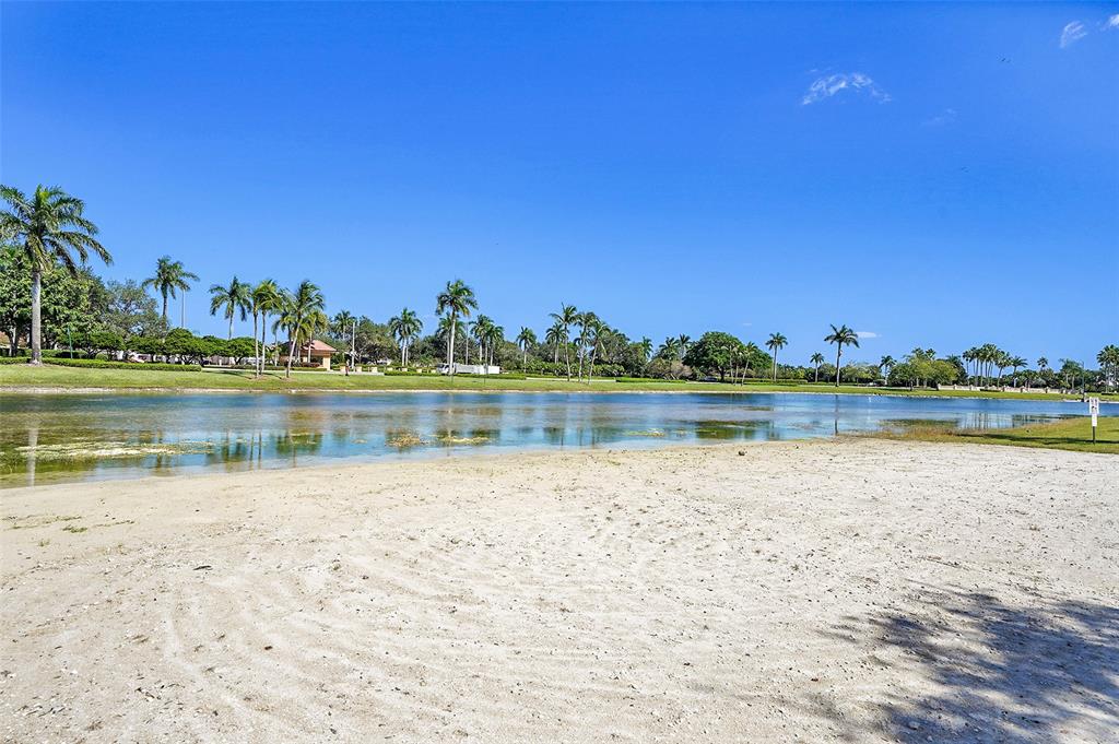 2634 Southwest 188th Avenue, Unit 2634 Miramar, FL 33029 - Photo 42 of 48 a view of a lake with houses in the back