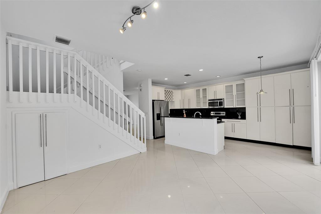 2634 Southwest 188th Avenue, Unit 2634 Miramar, FL 33029 - Photo 6 of 48 a view of a kitchen with an empty space