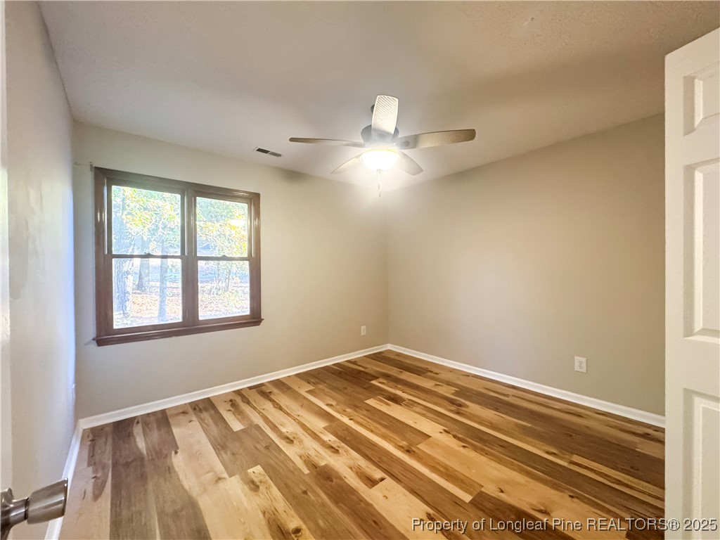 527 Coronation Drive Fayetteville, NC 28311 - Photo 12 of 16 a view of an empty room with a window