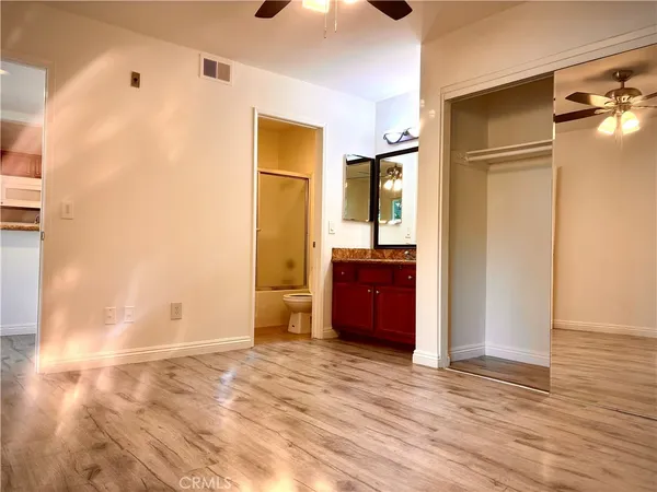 a view of kitchen with a refrigerator and a sink