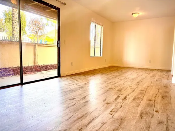 a view of an empty room and window