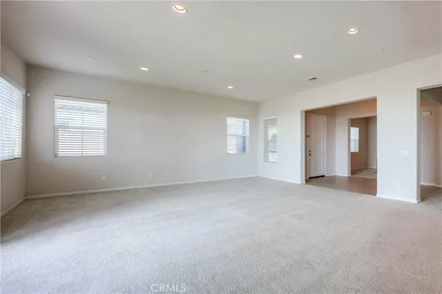 a large kitchen with stainless steel appliances lots of counter top space