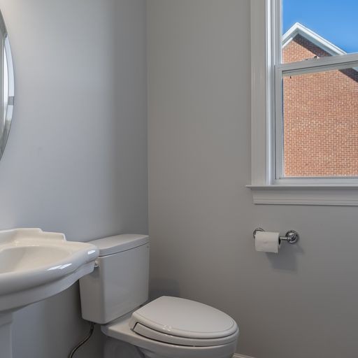 296 Rock Bridge Road Gallatin, TN 37066 - Photo 11 of 45 a white toilet sitting next to a white sink
