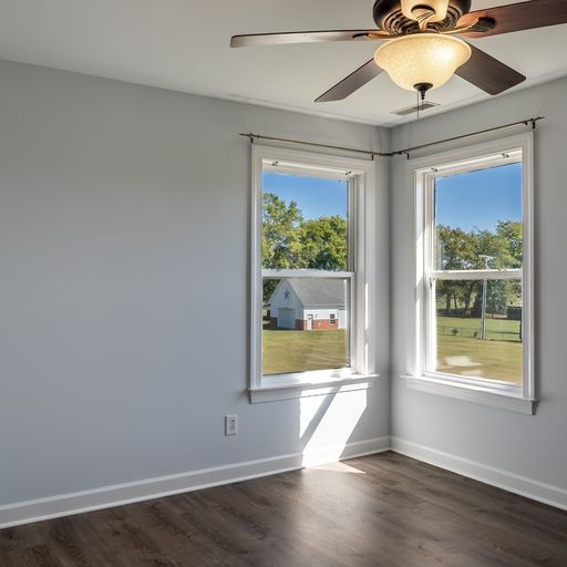 296 Rock Bridge Road Gallatin, TN 37066 - Photo 29 of 45 a view of an empty room with wooden floor and a window