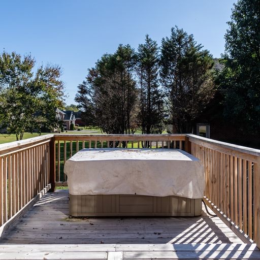 296 Rock Bridge Road Gallatin, TN 37066 - Photo 37 of 45 a view of a swimming pool with a lounge chair