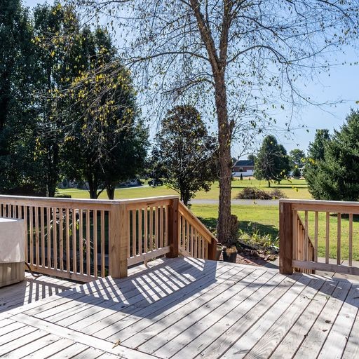 296 Rock Bridge Road Gallatin, TN 37066 - Photo 38 of 45 a view of deck with wooden floor and outdoor seating