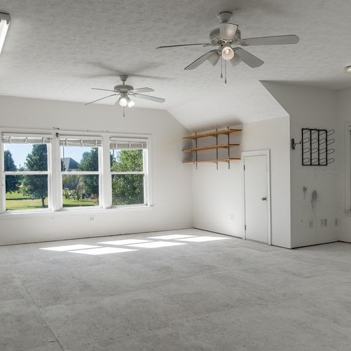 296 Rock Bridge Road Gallatin, TN 37066 - Photo 43 of 45 a view of a livingroom with a ceiling fan and window