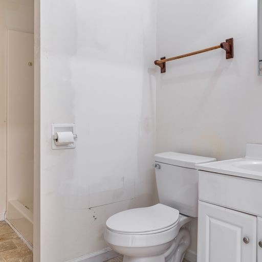 296 Rock Bridge Road Gallatin, TN 37066 - Photo 45 of 45 a white toilet sitting next to a shower