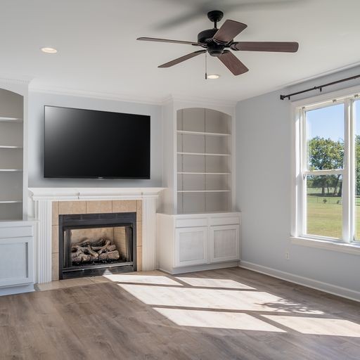 296 Rock Bridge Road Gallatin, TN 37066 - Photo 5 of 45 a view of an empty room with a fireplace and a window