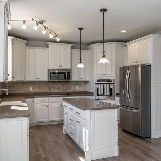 296 Rock Bridge Road Gallatin, TN 37066 - Photo 10 of 45 a kitchen with kitchen island granite countertop a sink a center island and stainless steel appliances