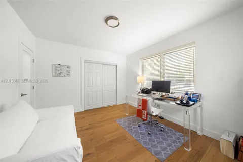a workspace with furniture and window