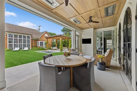 a view of a patio with couches table and chairs