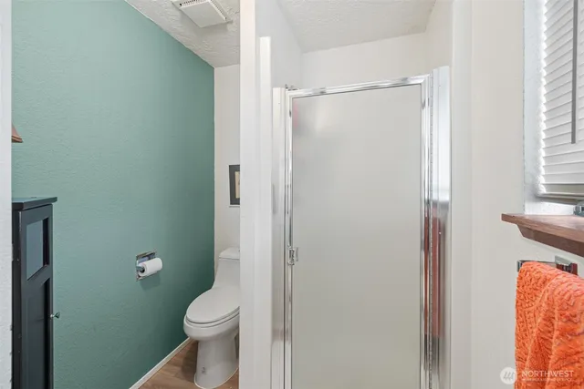 a room with a chair and furniture