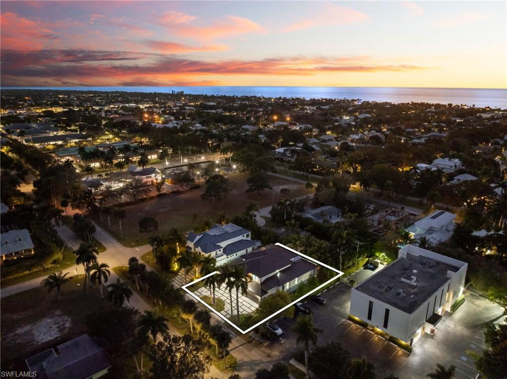 135 7th Street North Naples, FL 34102 - Photo 2 of 50 PERFECTLY LOCATED IN OLDE NAPLES, APPROX HALF A MILE TO WORLD CLASS BEACHES & LESS THAN 1 MILE TO ICONIC 5TH AVE WITH WORLD-CLASS DINING, SHOPPING & ENTERTAINMENT!