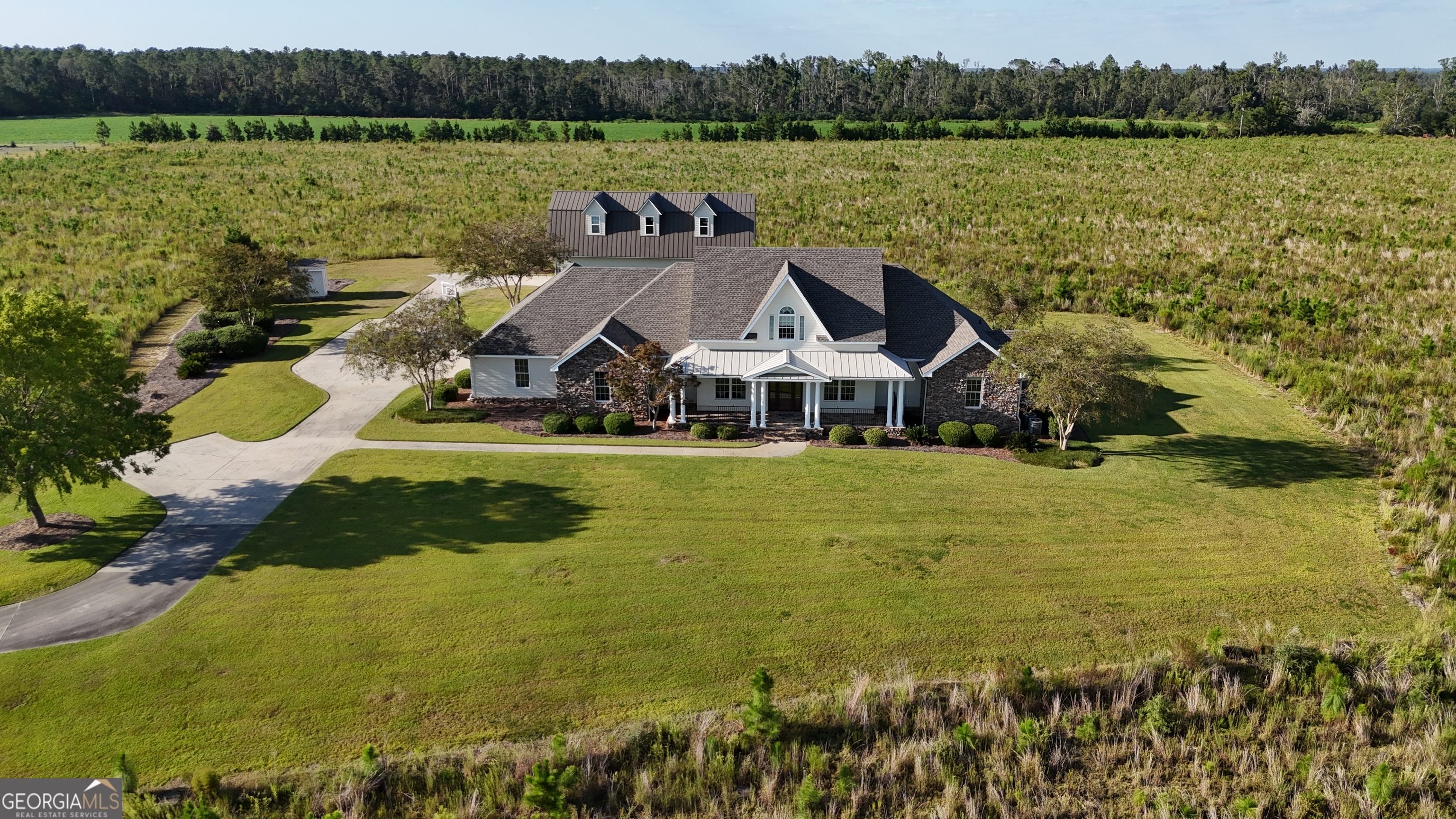 a view of a lake with houses in the background
