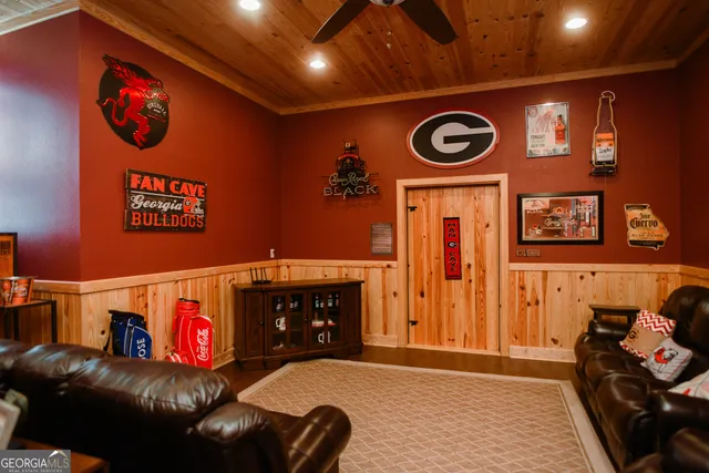 a view of a dining area with furniture and a chandelier