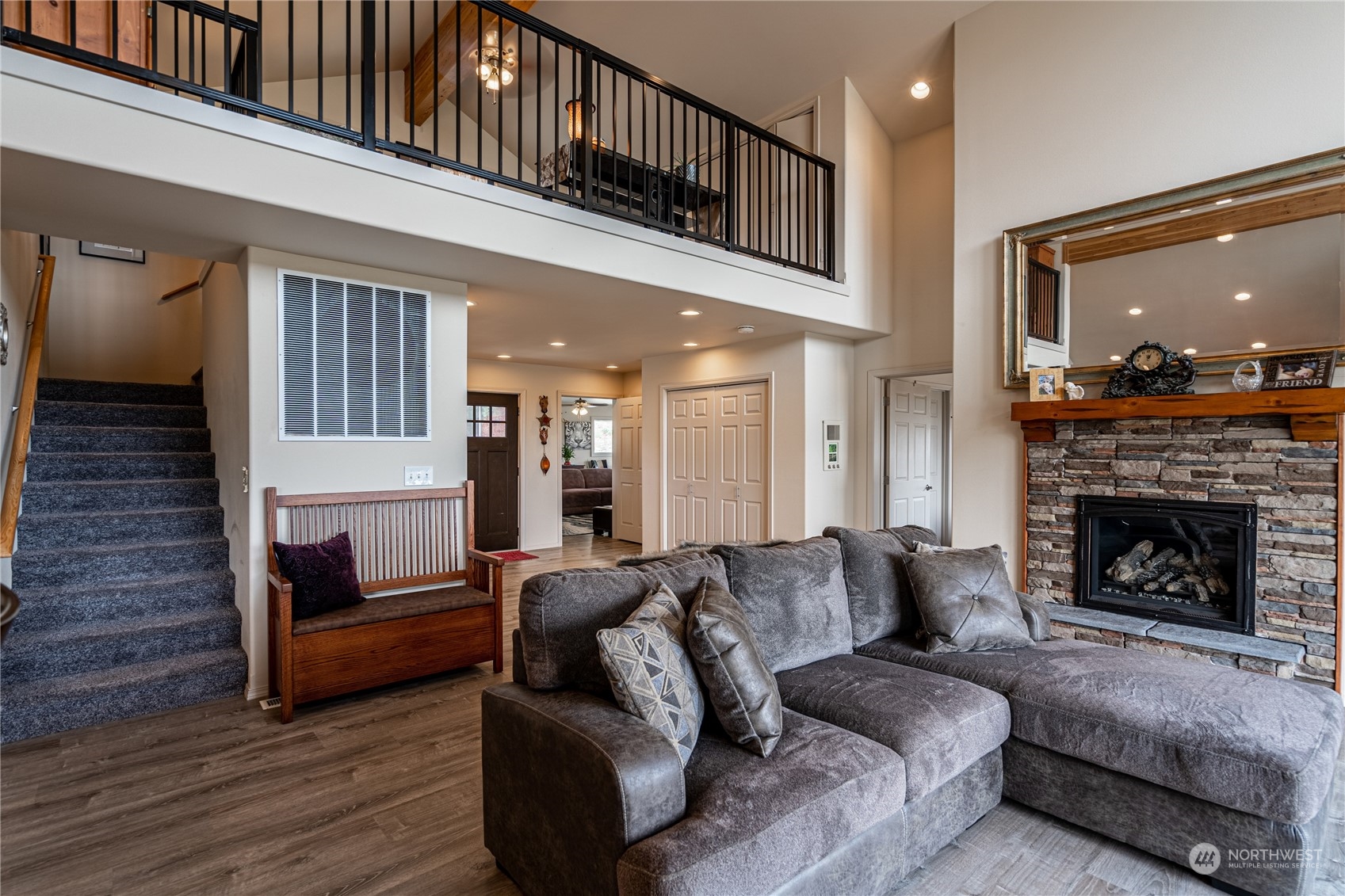 471 A Plata Road Brewster, WA 98812 - Photo 11 of 36 a living room with furniture and a fireplace