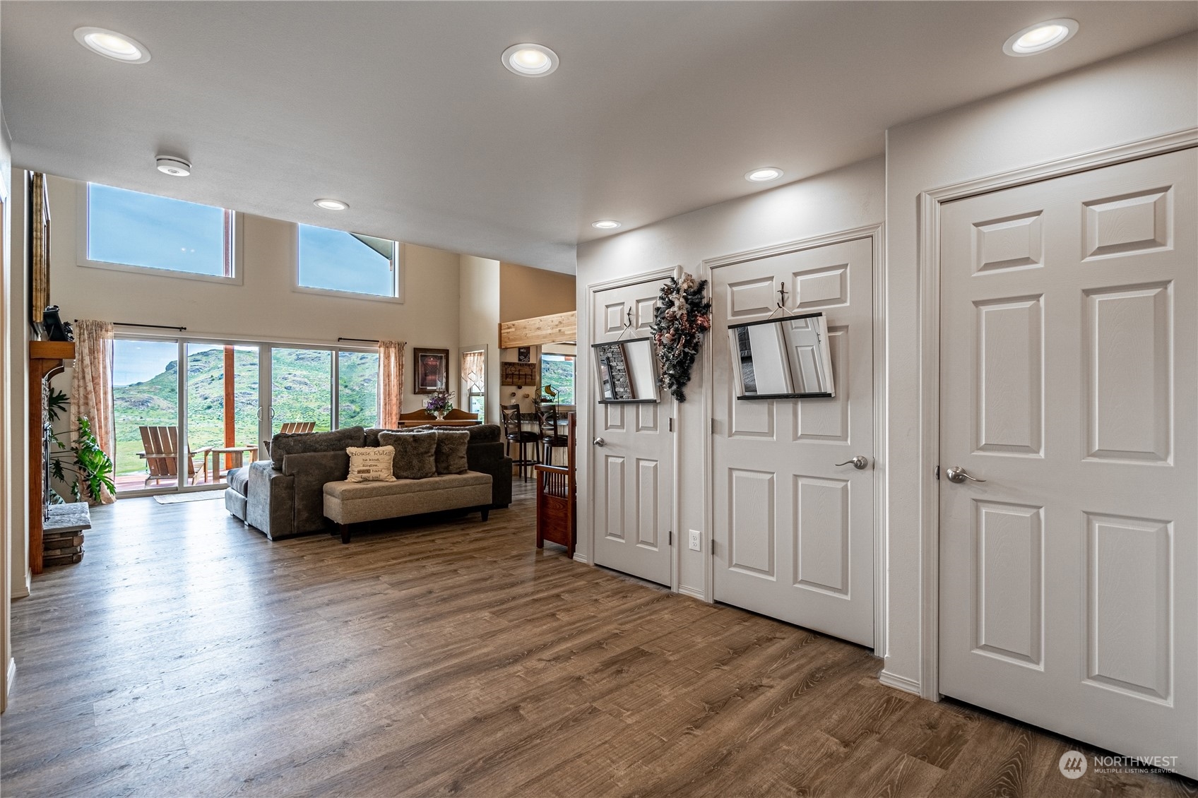 471 A Plata Road Brewster, WA 98812 - Photo 32 of 36 a living room with furniture and a wooden floor