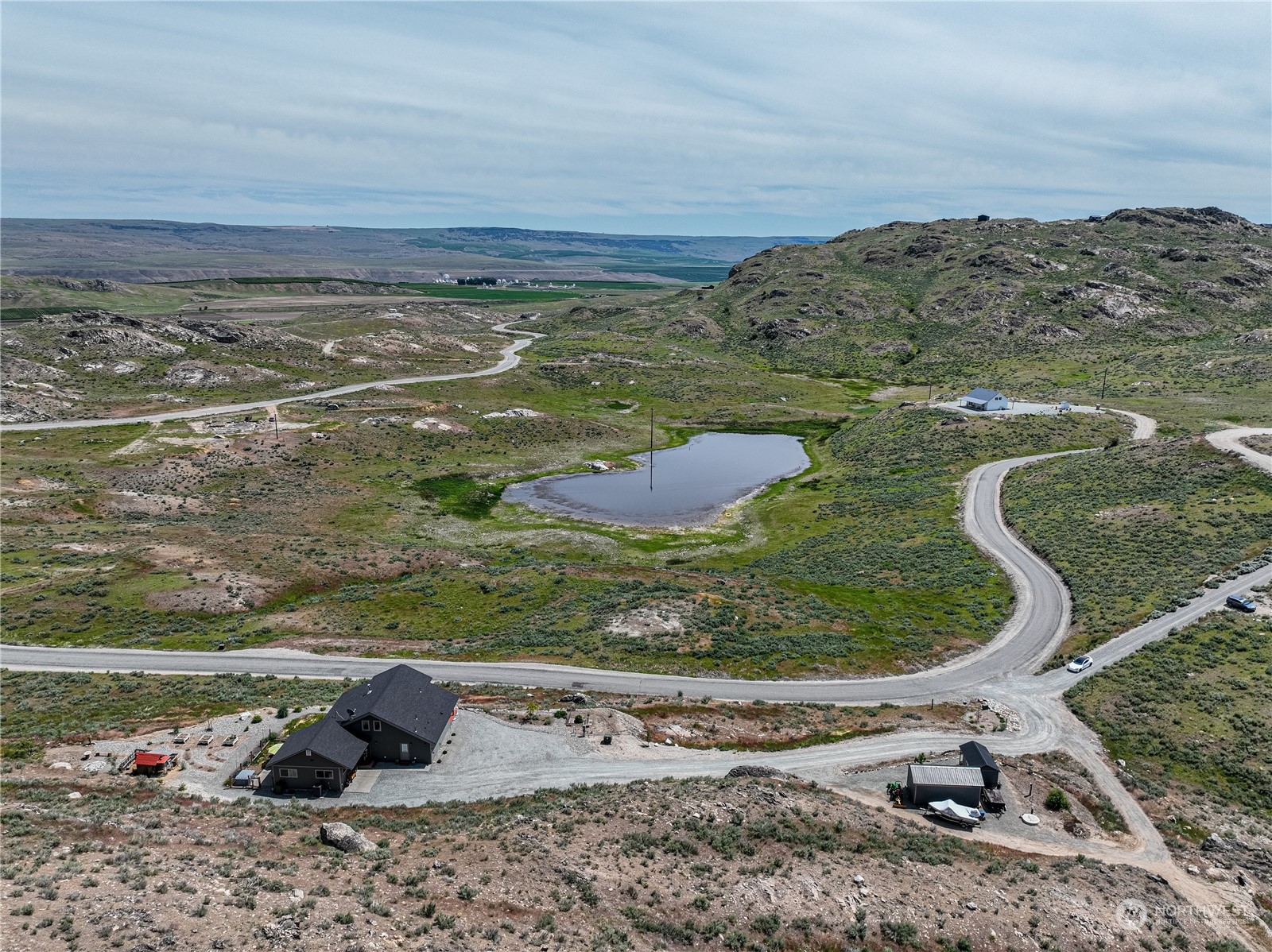 471 A Plata Road Brewster, WA 98812 - Photo 5 of 36 a view of a lake with a mountain