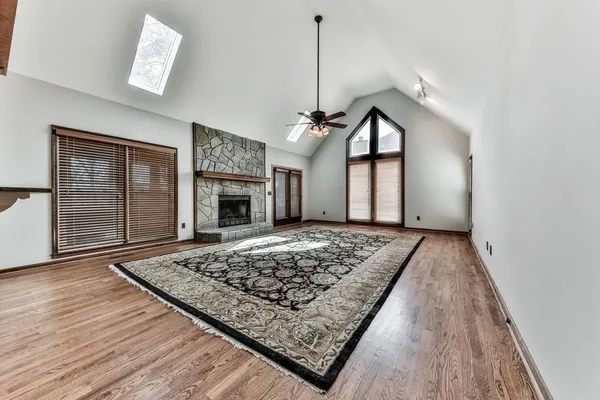 a view of livingroom with kitchen and furniture