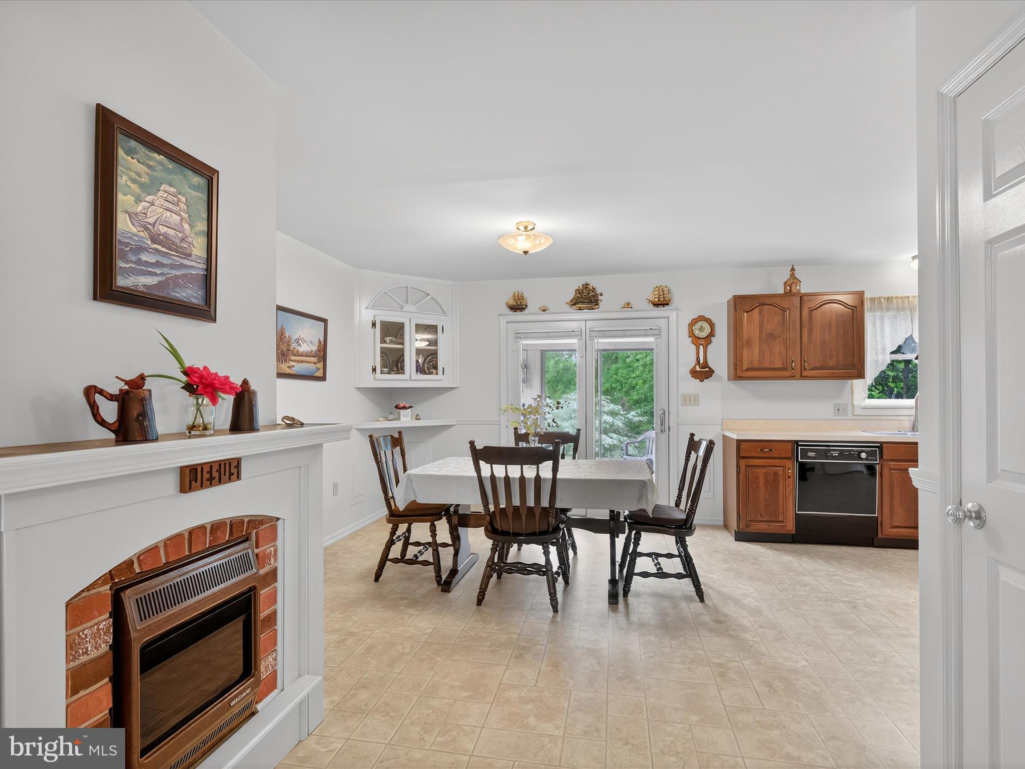 203 Pleasant Hill Drive Lititz, PA 17543 - Photo 11 of 46 a dining room with furniture and a kitchen area