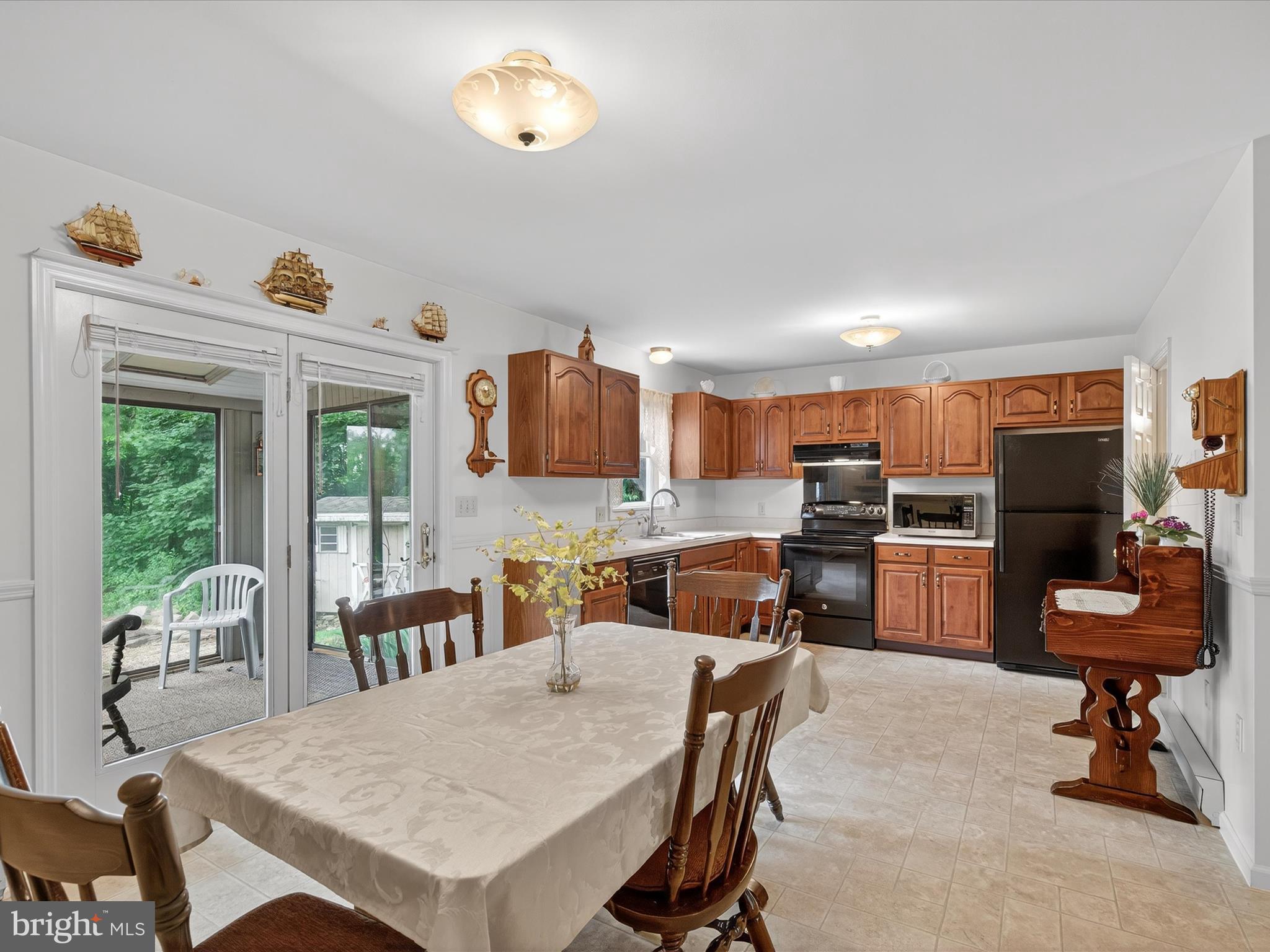 203 Pleasant Hill Drive Lititz, PA 17543 - Photo 12 of 46 a view of a dining room with furniture