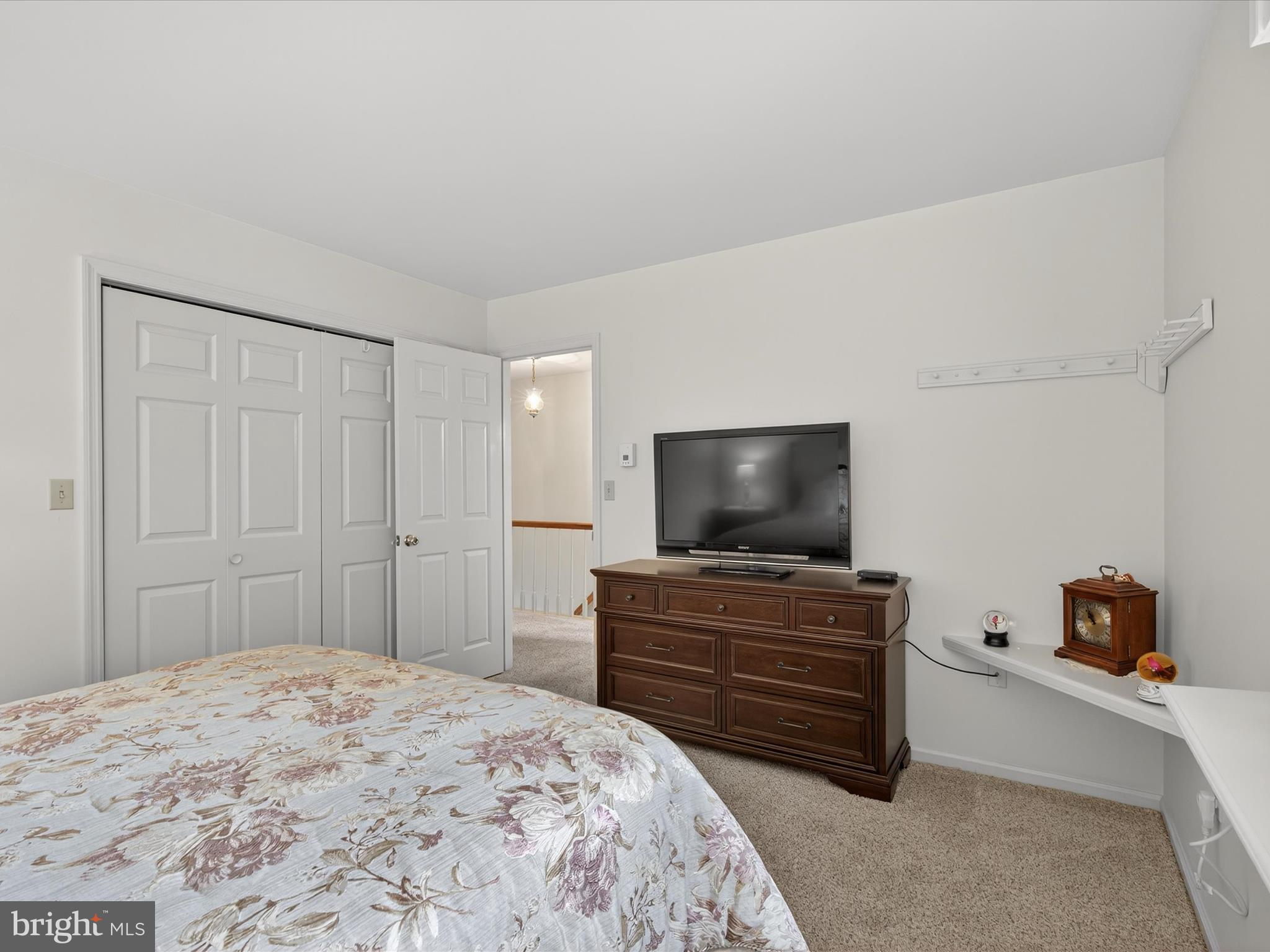 203 Pleasant Hill Drive Lititz, PA 17543 - Photo 23 of 46 a bedroom with a bed and a flat screen tv